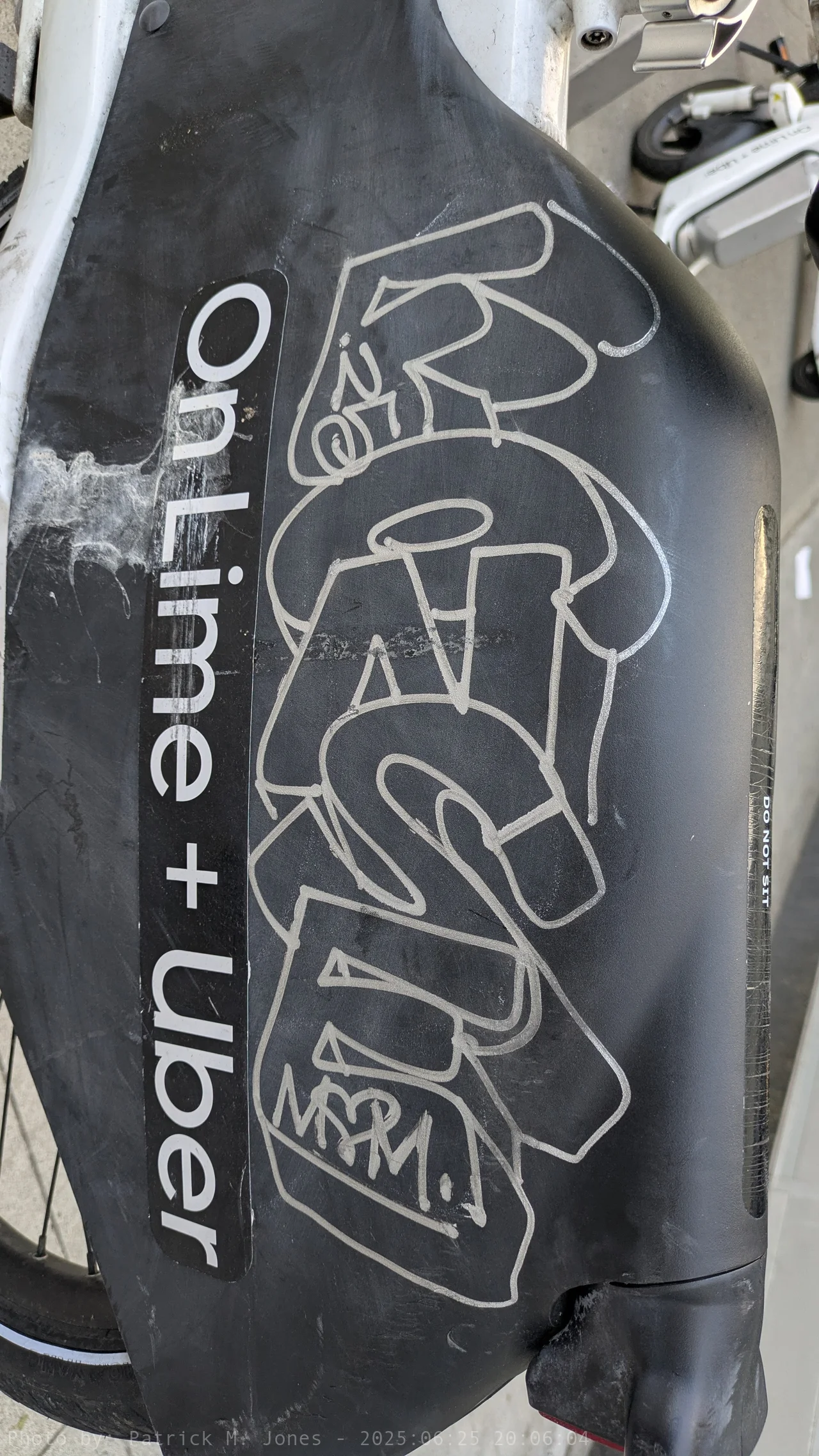 Fonse 3-D tag on a Lime bike