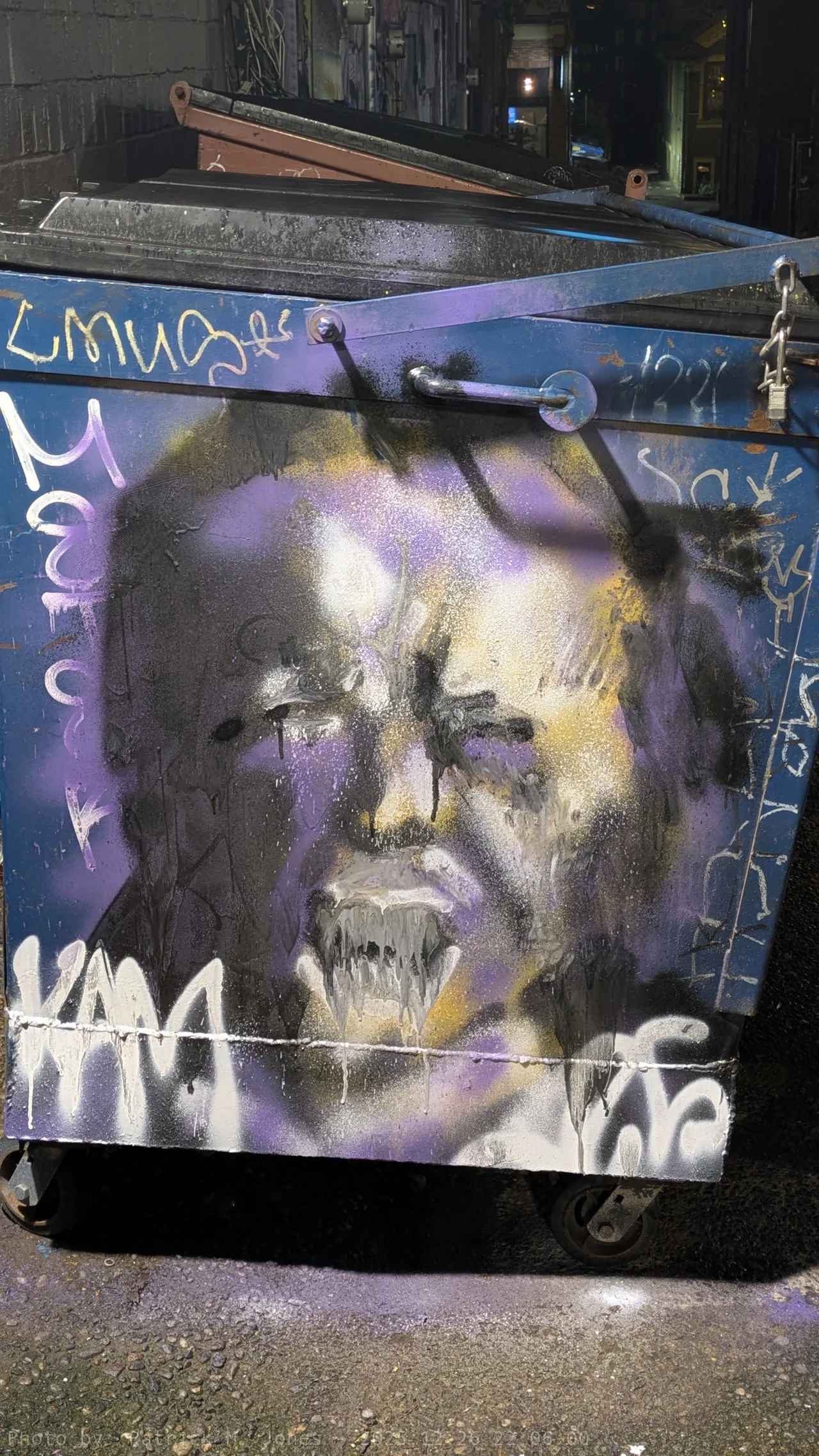 Fanged Face on Dumpster