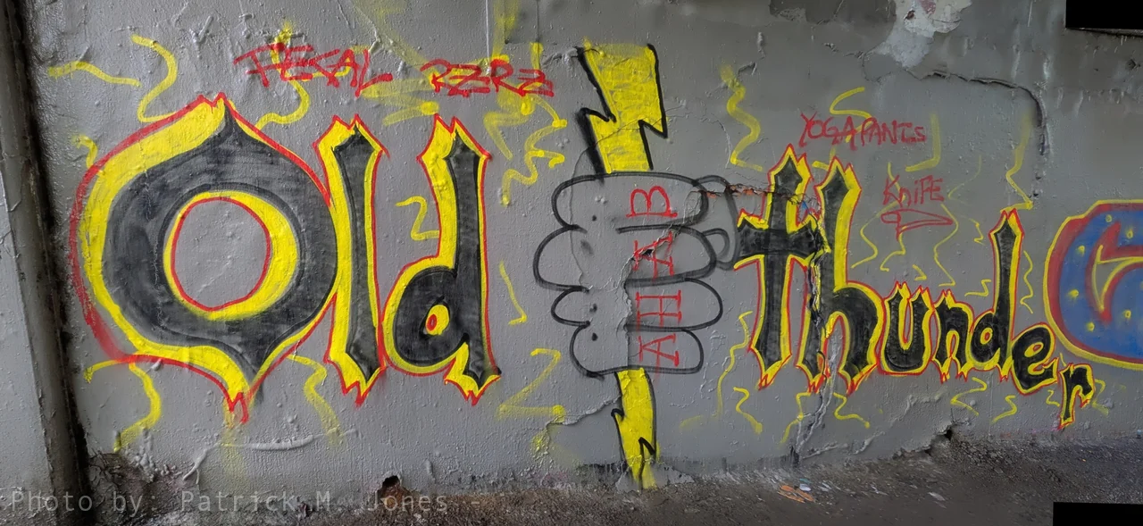 Old Thunder graffiti piece with Ahab fist character